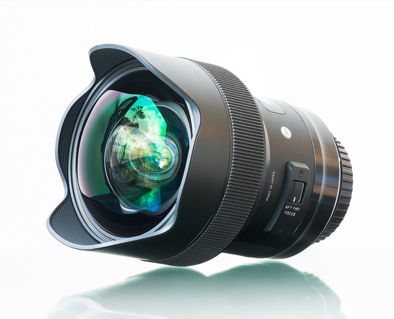 A 14 mm f/1.8 wide-angle prime lens with a large bulbous front element