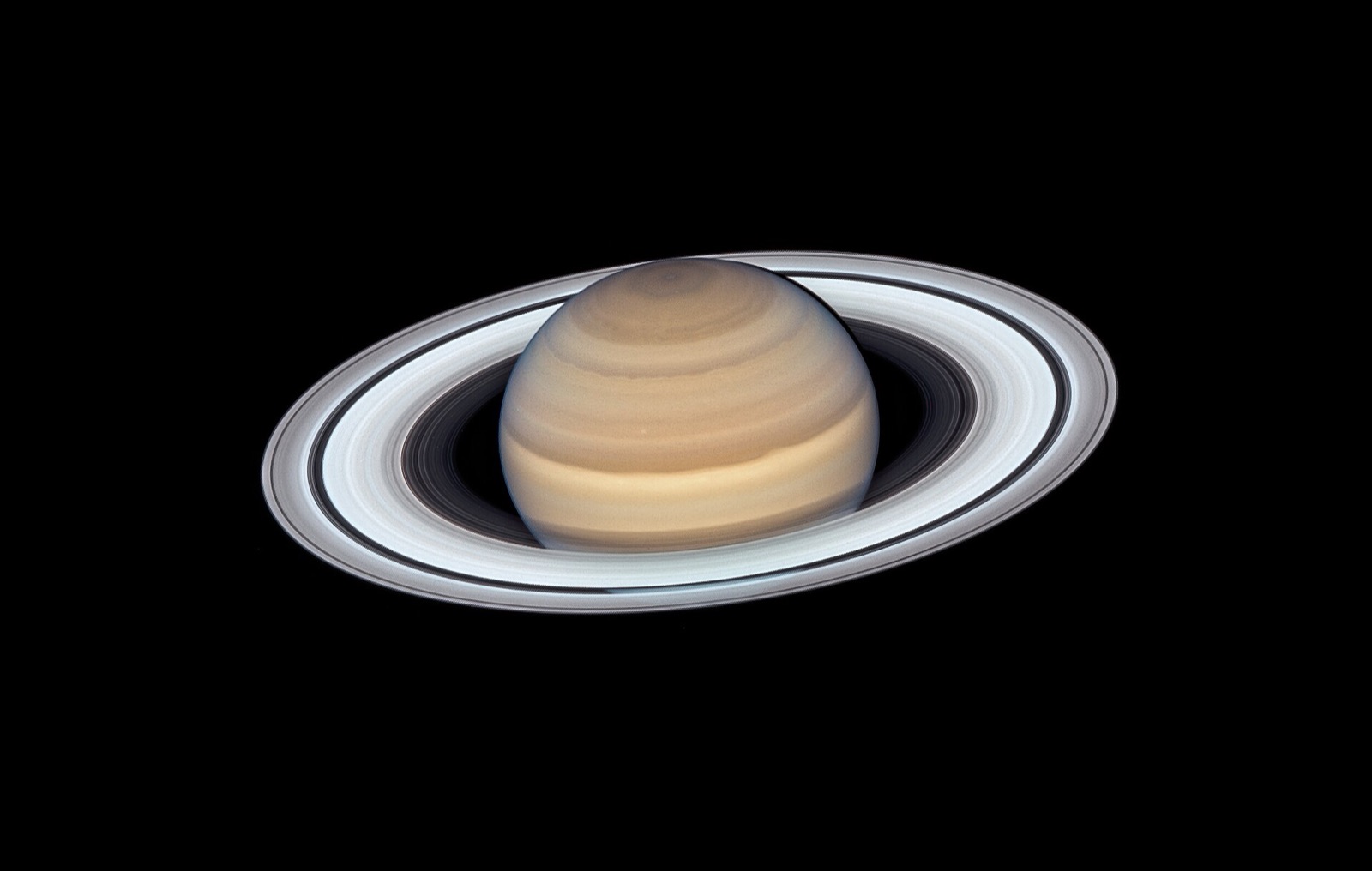 Saturn with its rings wide open, imaged by the Hubble Space Telescope